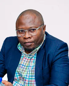 Nhojo A Kushoka - Executive Director